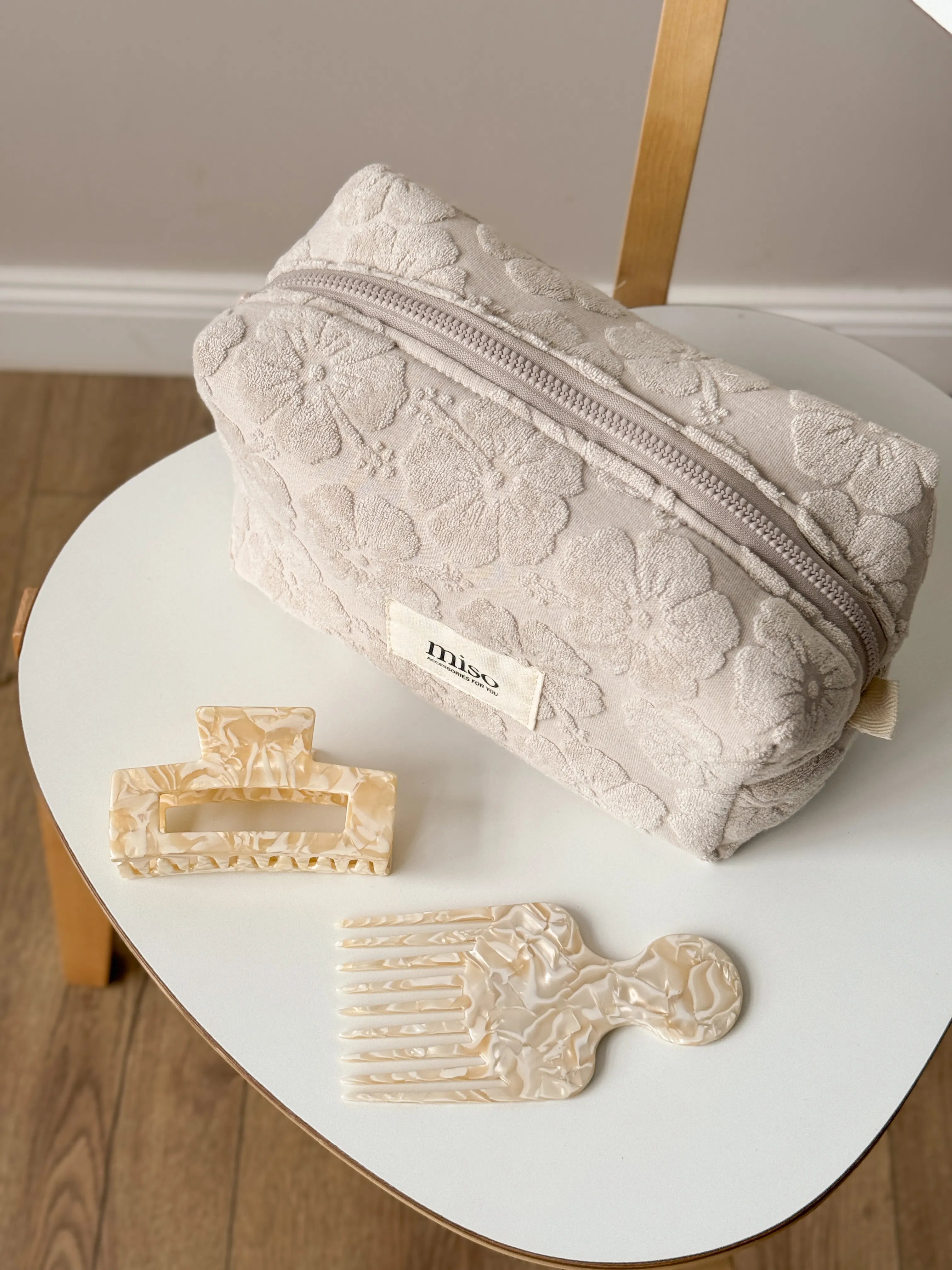 Medium jacquard terry cosmetic bag with flowers, milky color