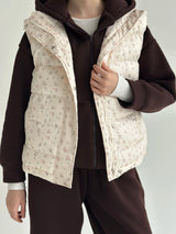 Quilted puffy vest in milky pink flower
