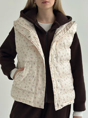 Quilted puffy vest in milky pink flower
