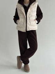 Quilted puffy vest in milky pink flower