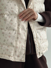 Quilted puffy vest in milky pink flower