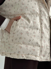Quilted puffy vest in milky pink flower