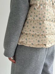 Quilted puffy vest in milky blue flower