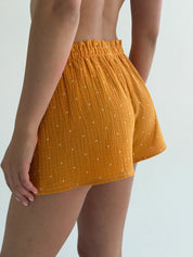 Muslin T-shirt and shorts suit, white and mustard polka dots