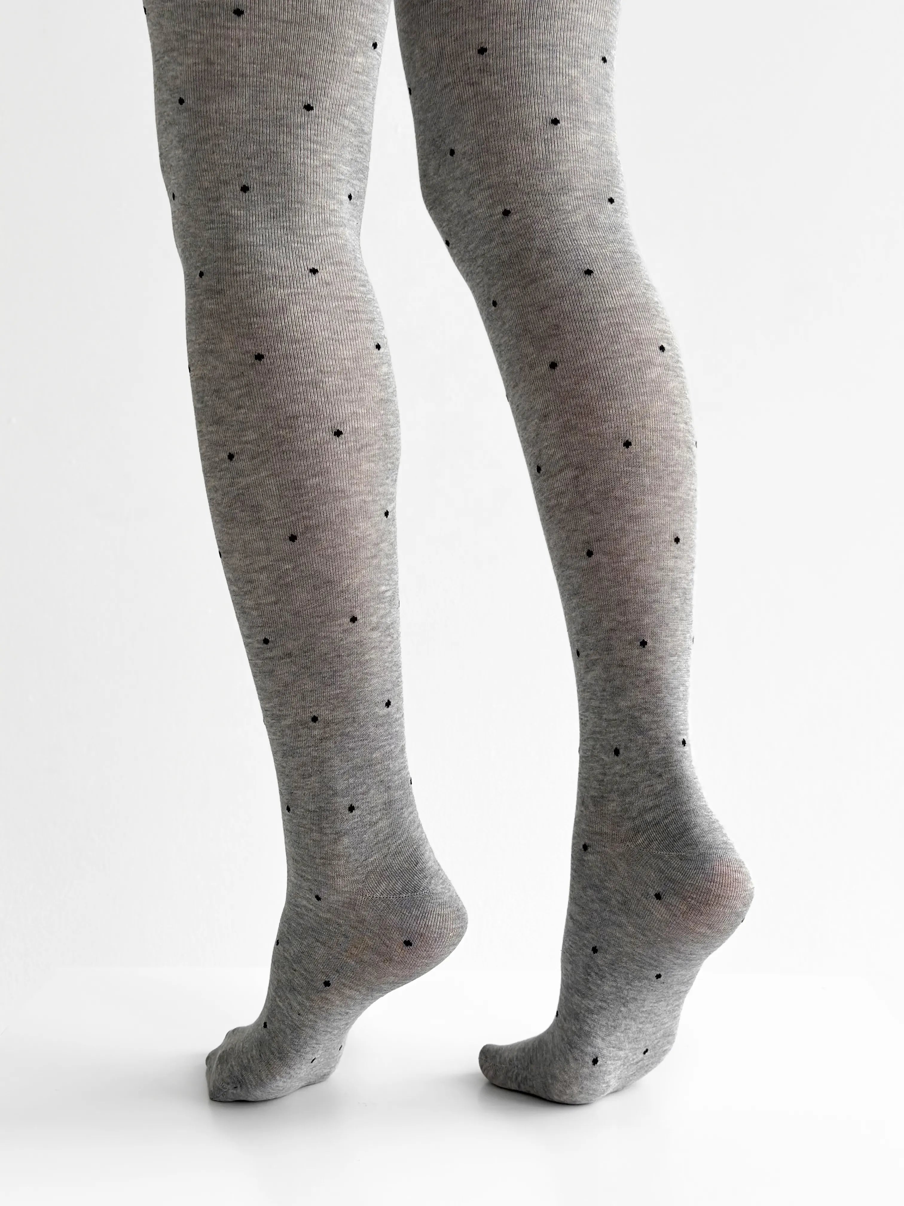 Knitted tights black polka dots on gray