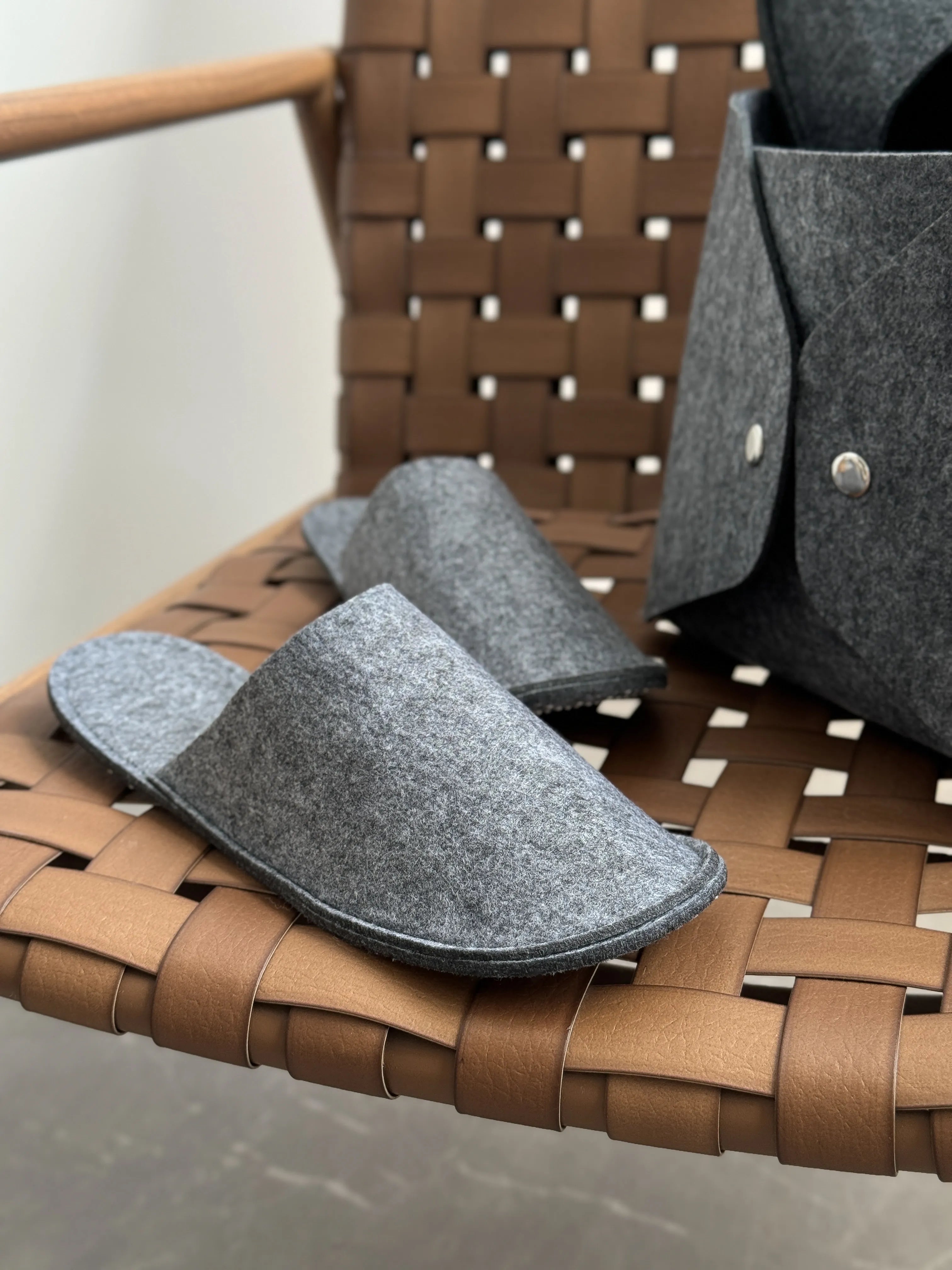 Set of guest slippers and basket