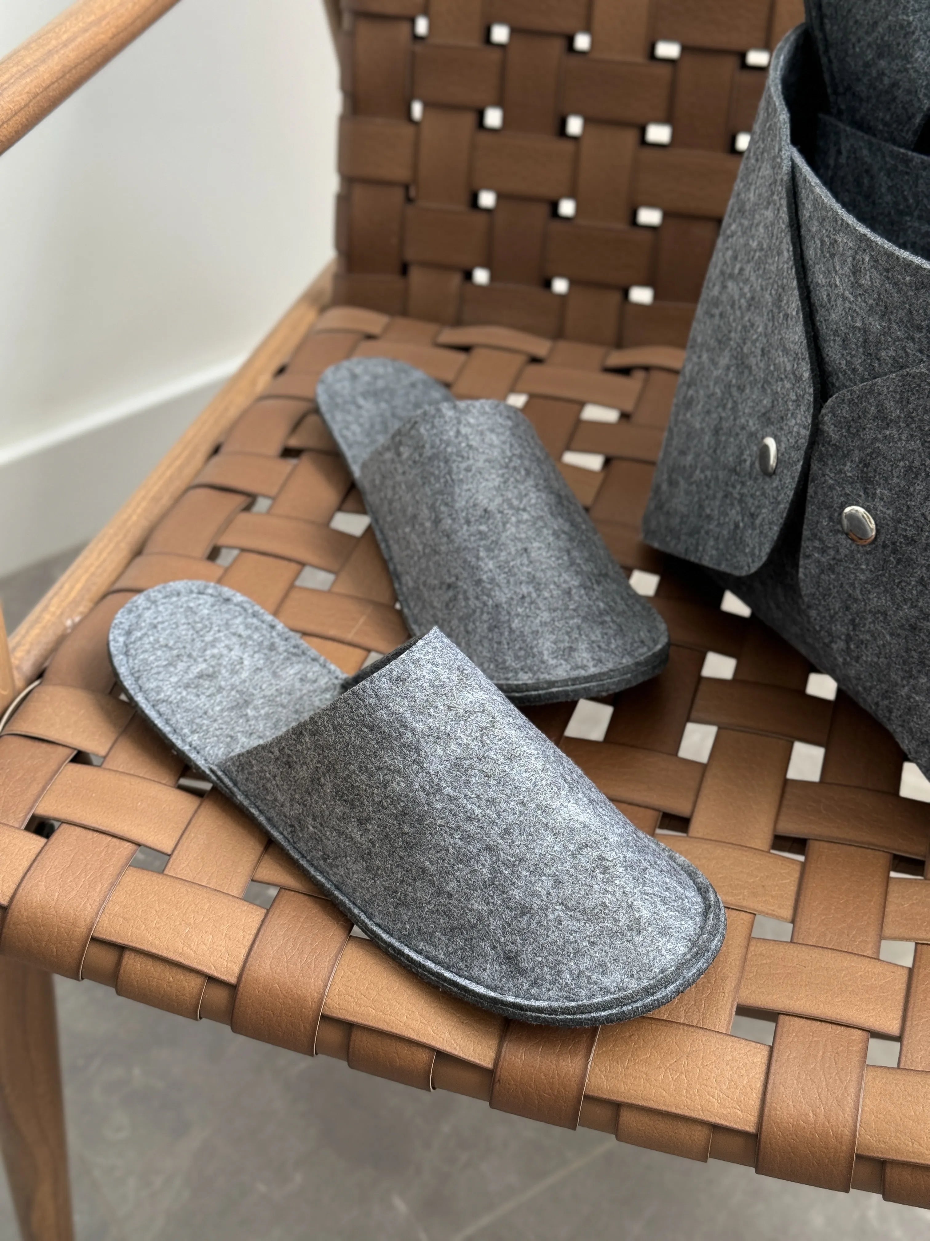 Set of guest slippers and basket