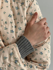 Quilted demi-season jacket, milky blue with a blue flower