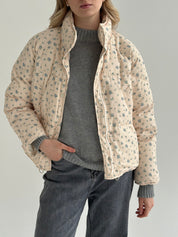 Quilted demi-season jacket, milky blue with a blue flower