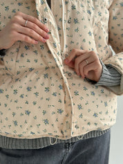 Quilted demi-season jacket, milky blue with a blue flower