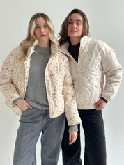 Quilted demi-season jacket, milky blue with a blue flower