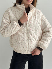Quilted demi-season jacket, milky white with pink flower