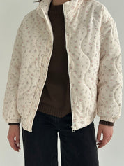 Quilted demi-season jacket, milky white with pink flower