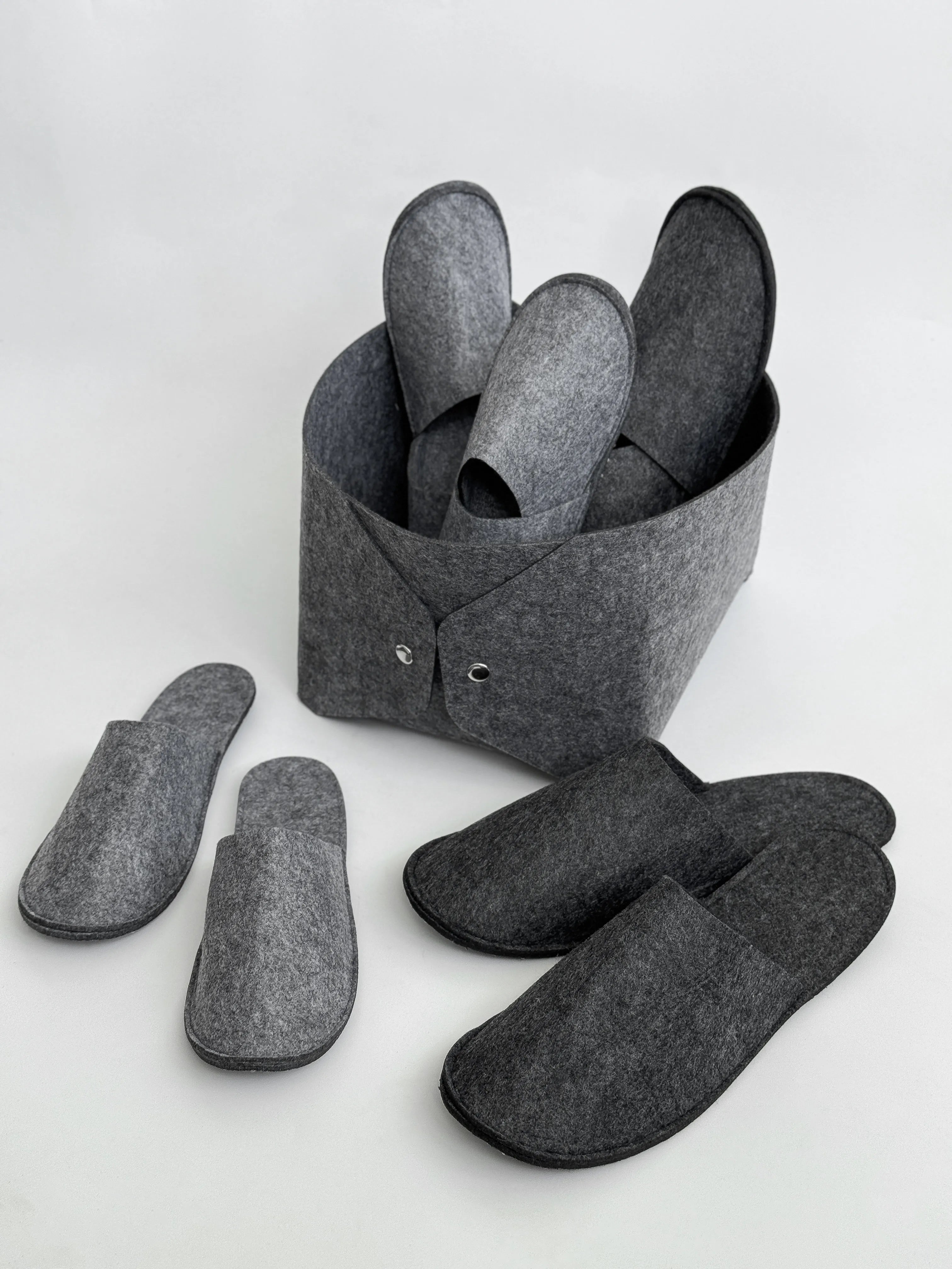 Set of guest slippers and basket