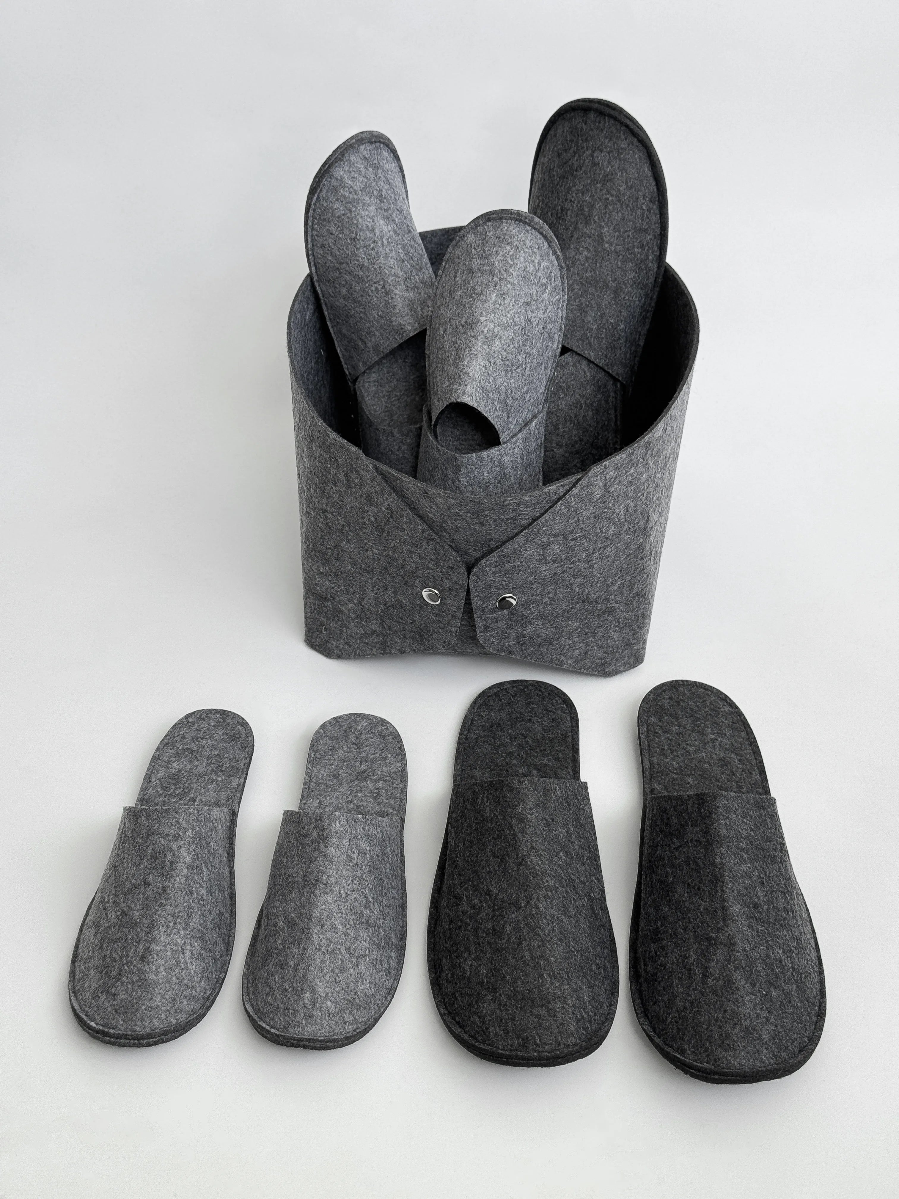 Set of guest slippers and basket