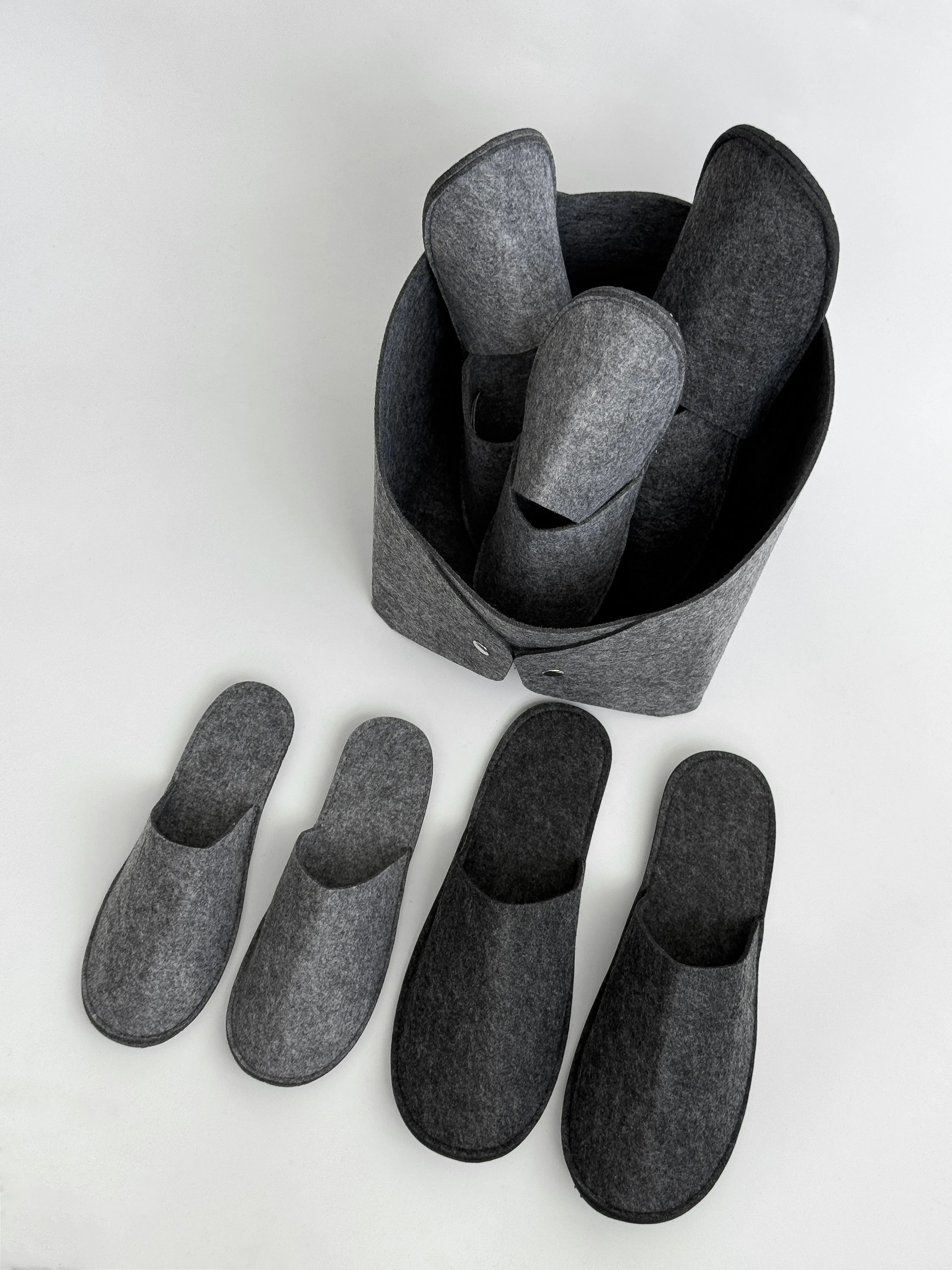 Set of guest slippers and basket