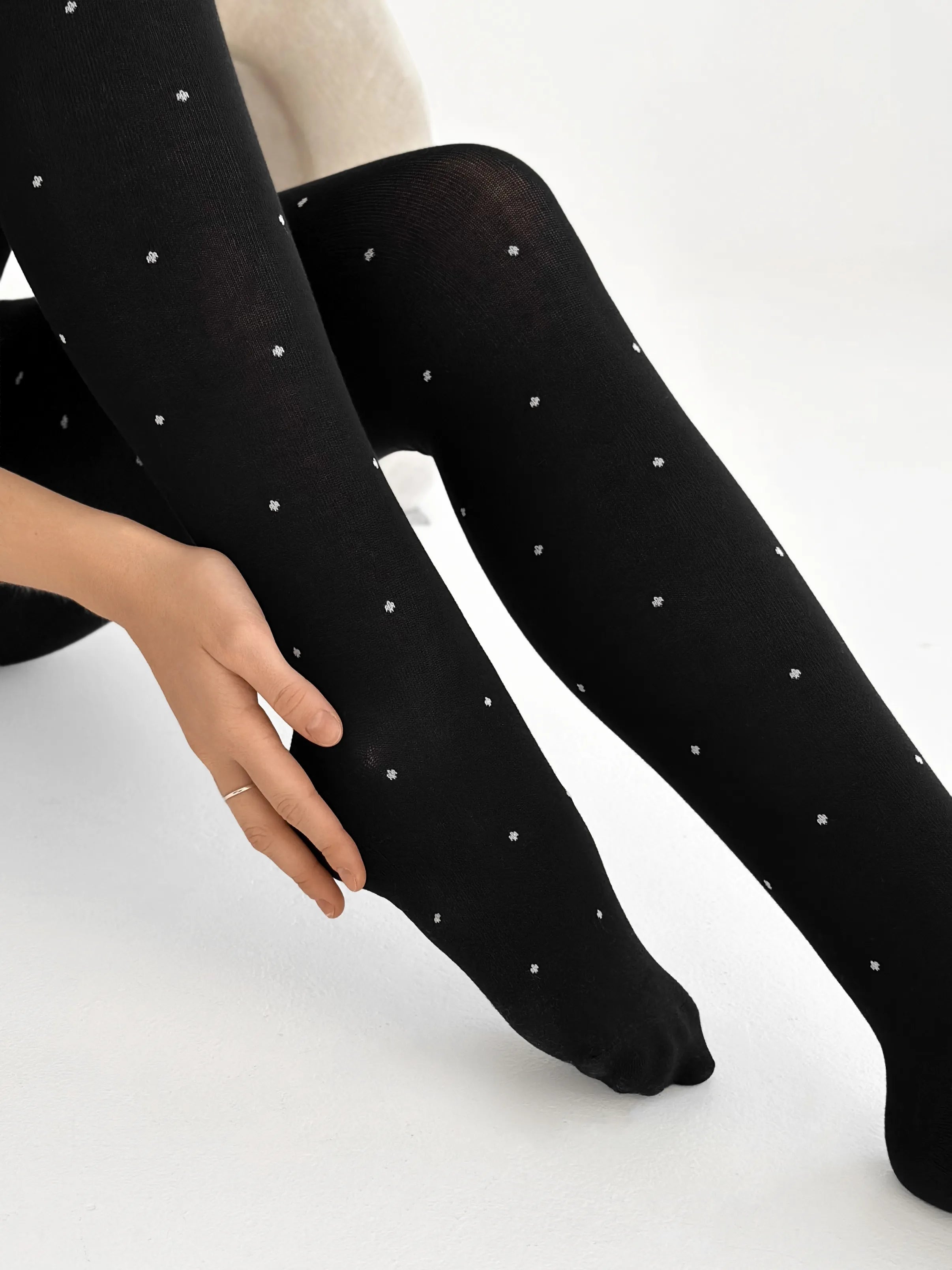 Knitted tights white polka dots on black