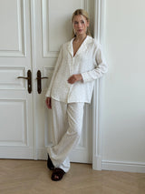 Long sleeve shirt and muslin tulip pants suit on white