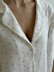 Long sleeve shirt and muslin tulip pants suit on white