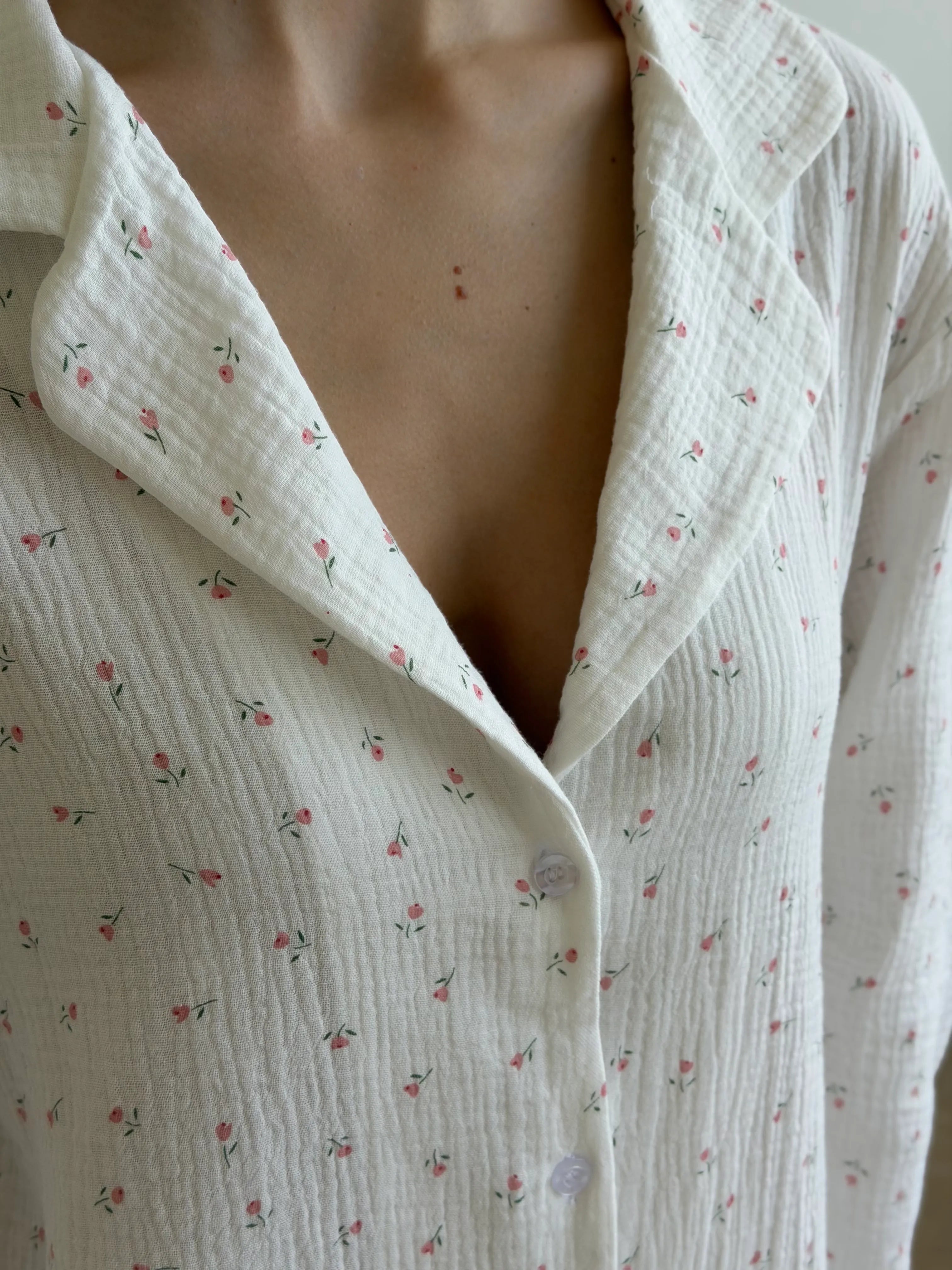 Long sleeve shirt and muslin tulip pants suit on white