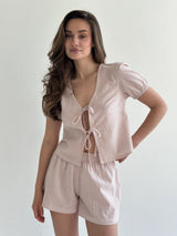 Thin striped cotton suit, bow blouse and powder/milk shorts