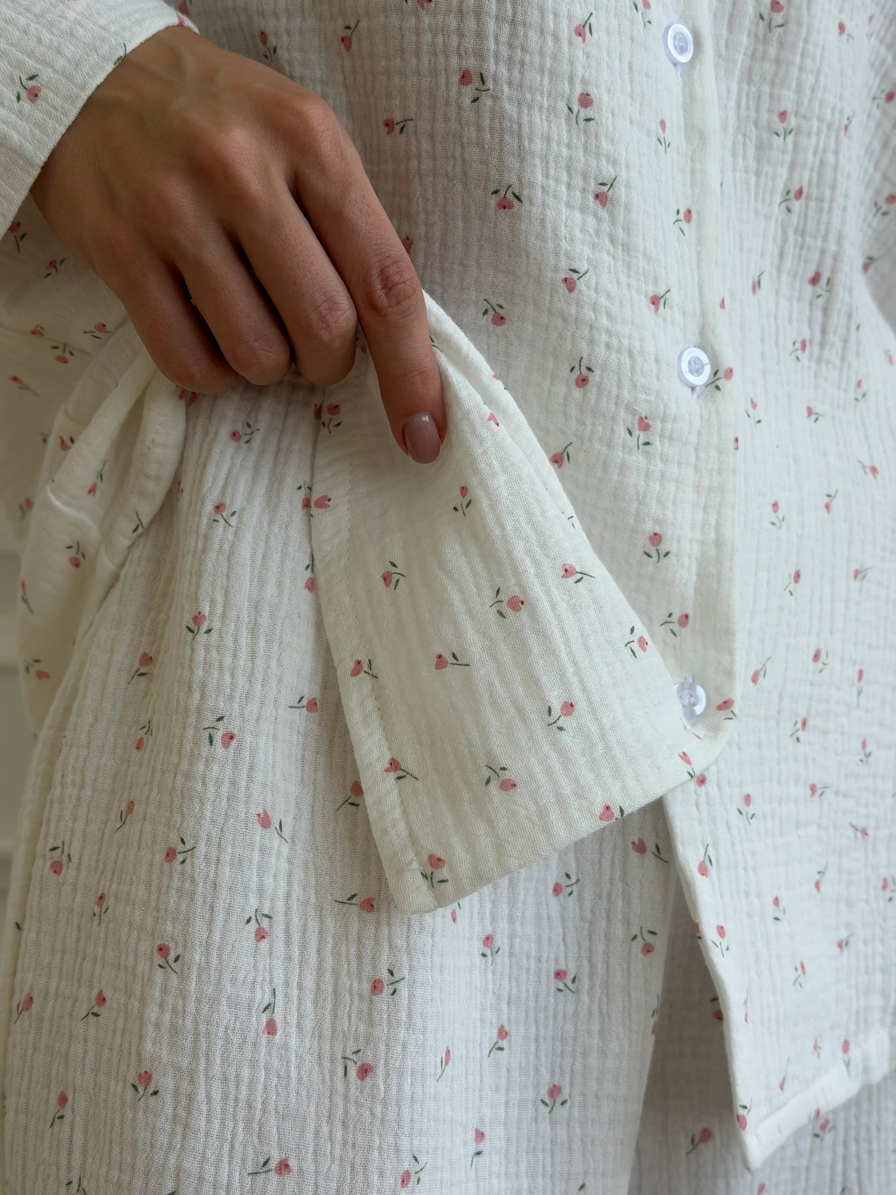 Long sleeve shirt and muslin tulip pants suit on white