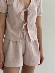 Thin striped cotton suit, bow blouse and powder/milk shorts