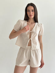Thin striped cotton suit, bow blouse and beige/milk shorts