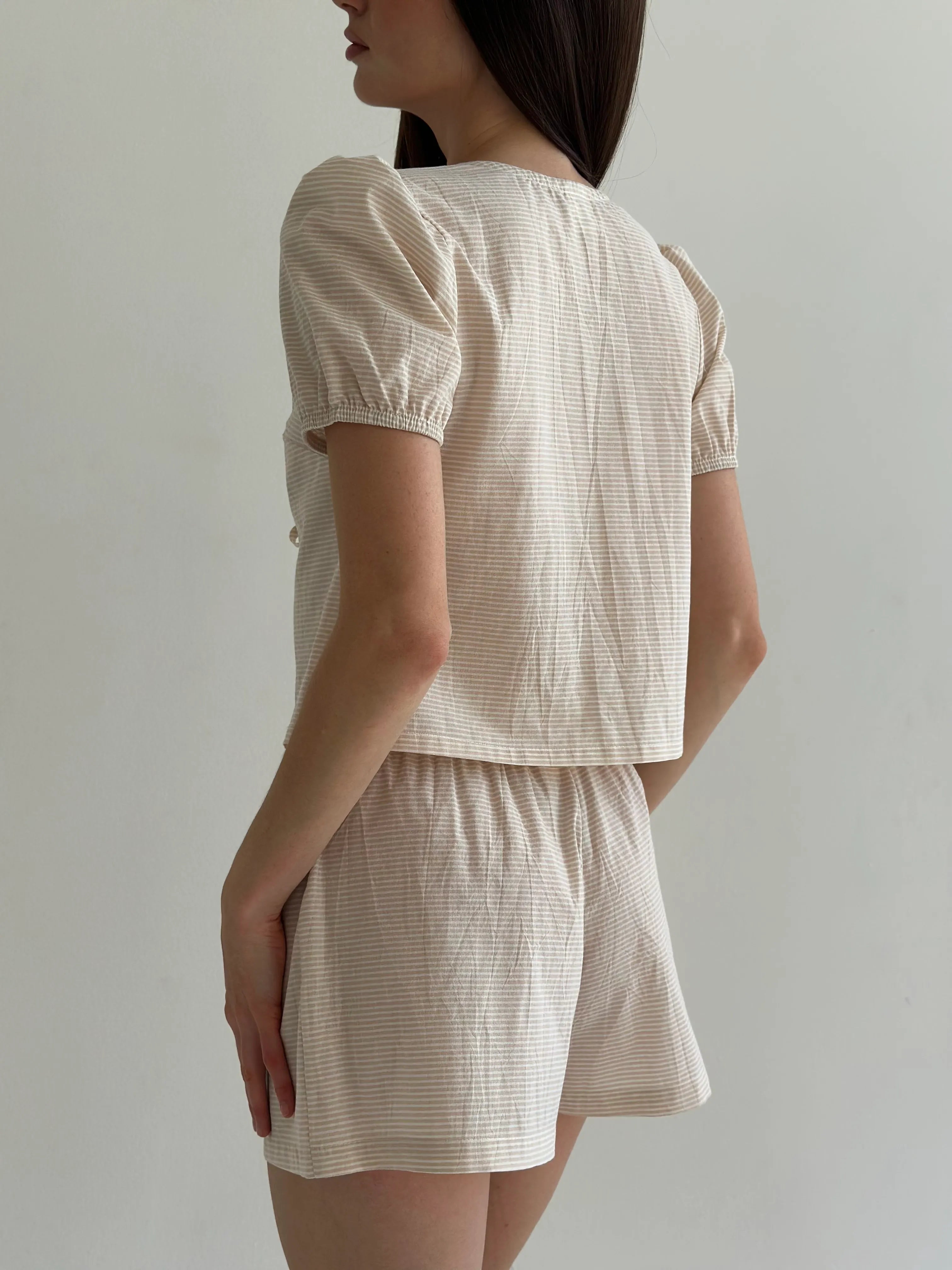 Thin striped cotton suit, bow blouse and beige/milk shorts