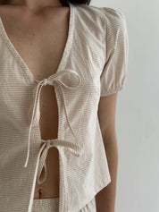 Thin striped cotton suit, bow blouse and beige/milk shorts