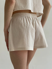 Thin striped cotton suit, bow blouse and beige/milk shorts