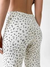 Ribbed milk joggers with a blue flower