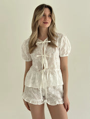 Tie-dye blouse and ruffled shorts suit, cambric flowers, milky