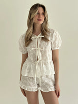 Tie-dye blouse and ruffled shorts suit, cambric flowers, milky
