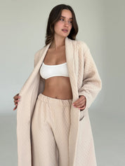 Beige quilted knit pants