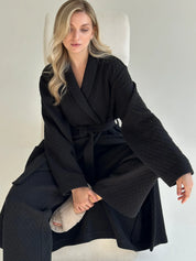 Black quilted knit pants