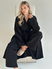 Black quilted knit pants