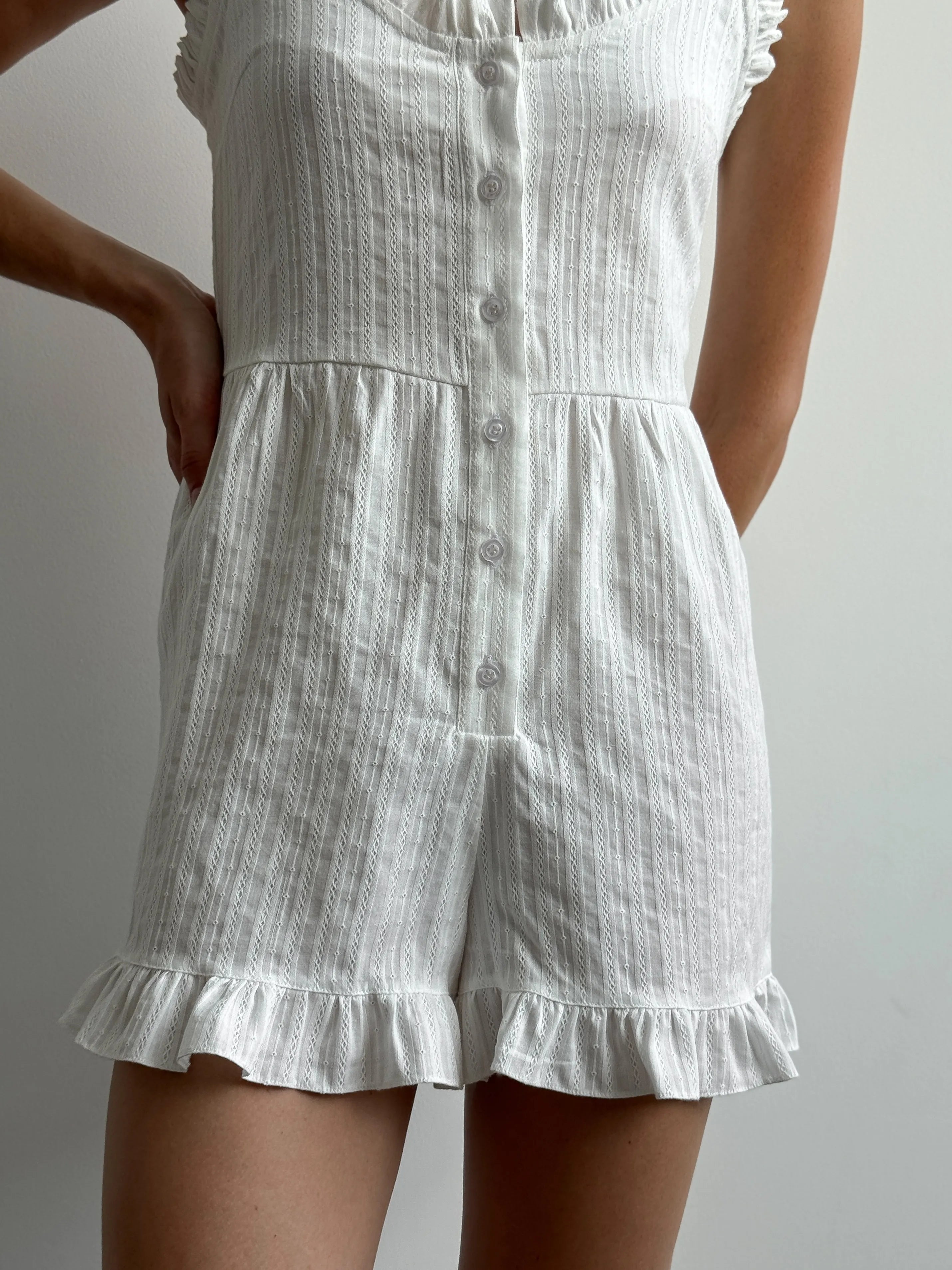 Women's white cambric jumpsuit with a pattern