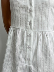 Women's white cambric jumpsuit with a pattern
