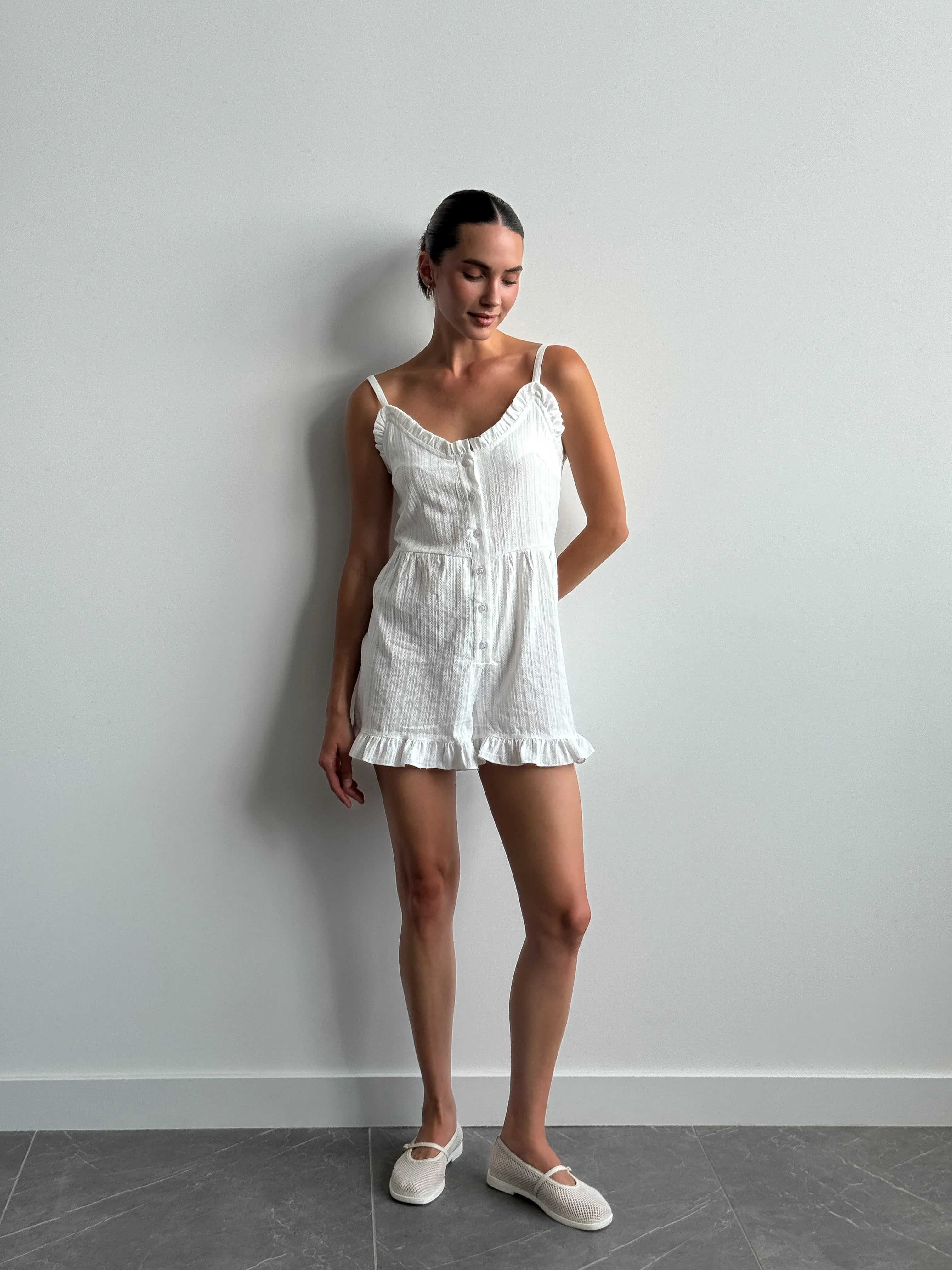 Women's white cambric jumpsuit with a pattern