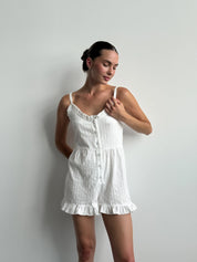 Women's white cambric jumpsuit with a pattern