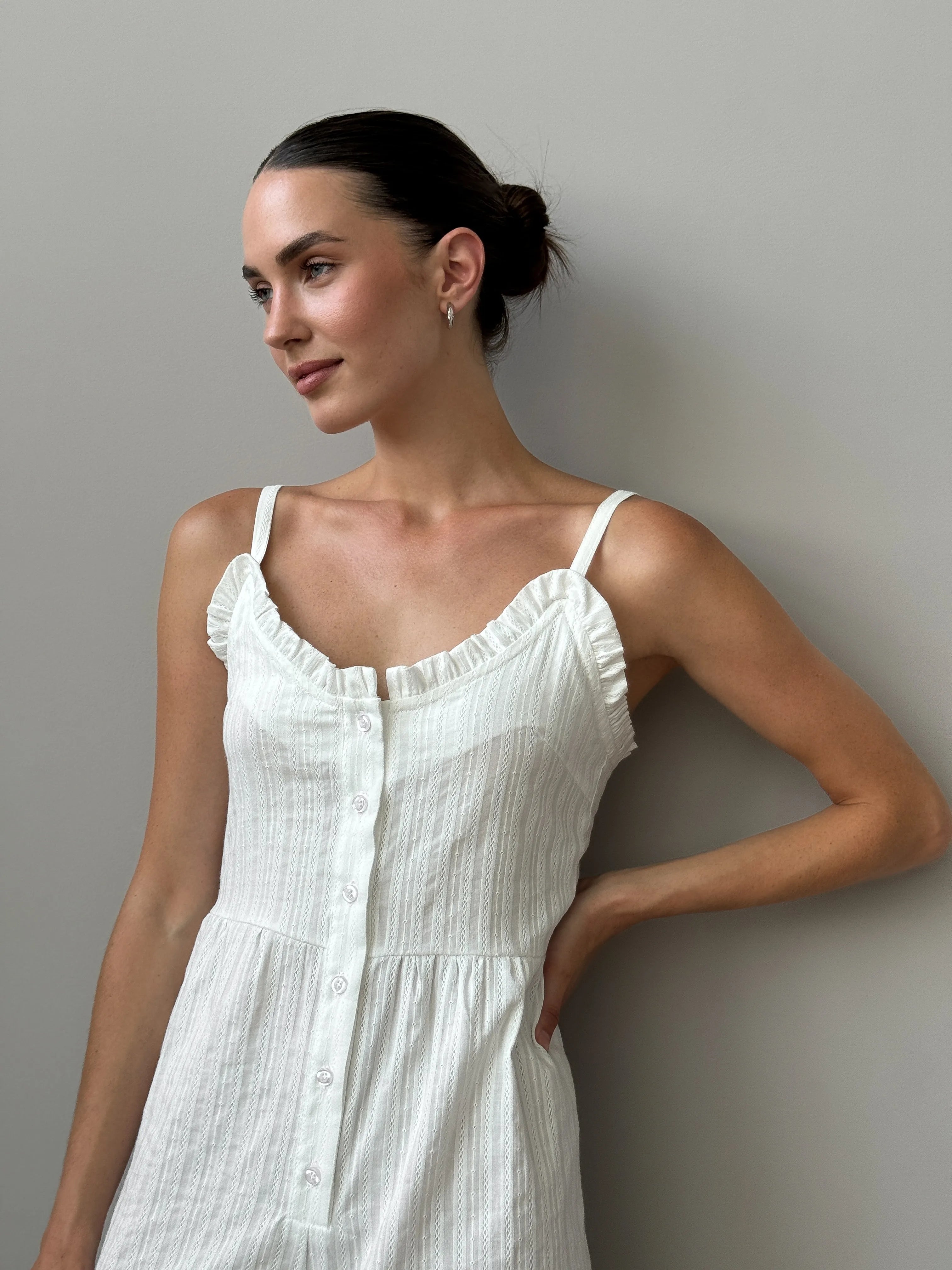 Women's white cambric jumpsuit with a pattern