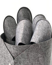 Set of guest slippers and basket
