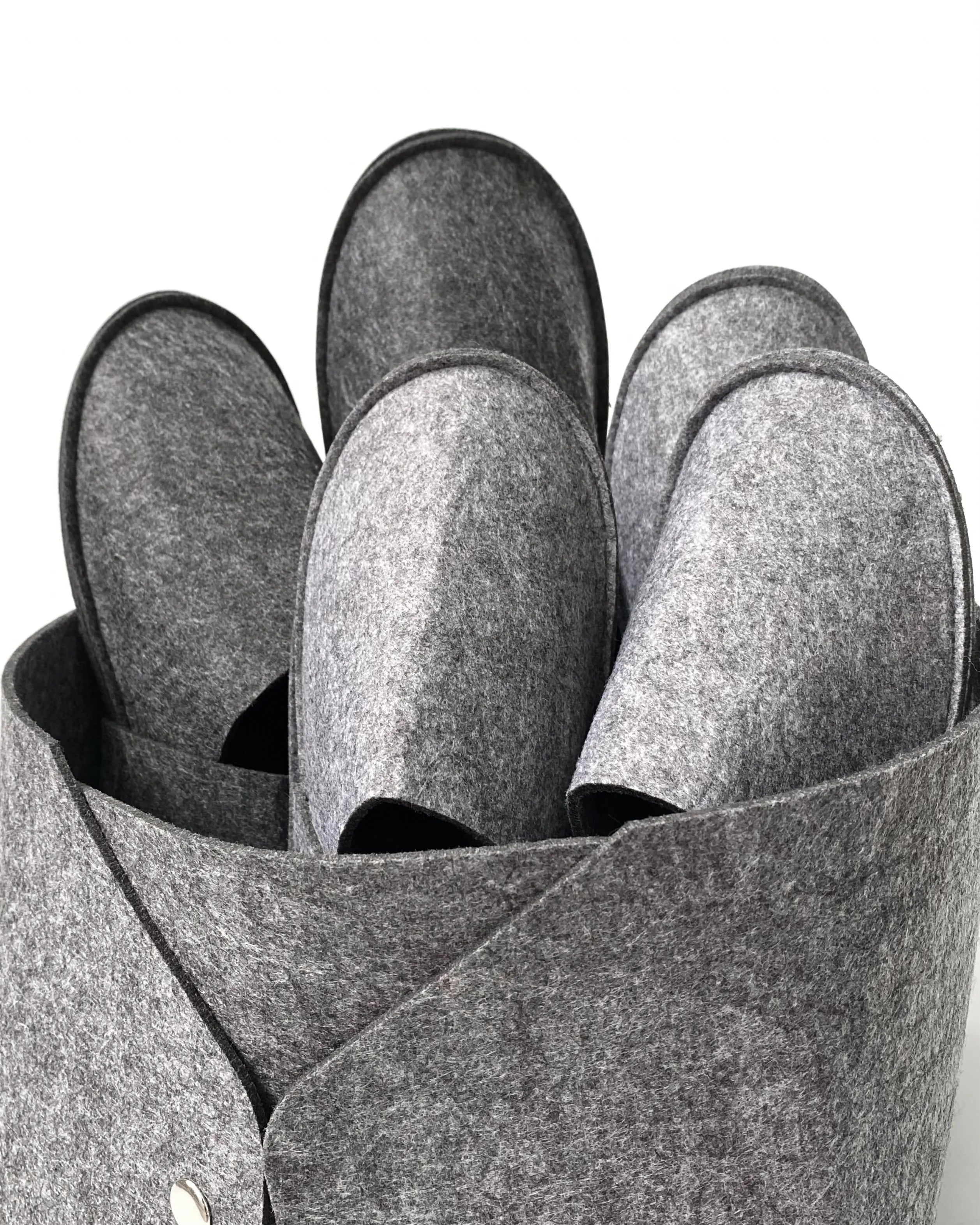 Set of guest slippers and basket