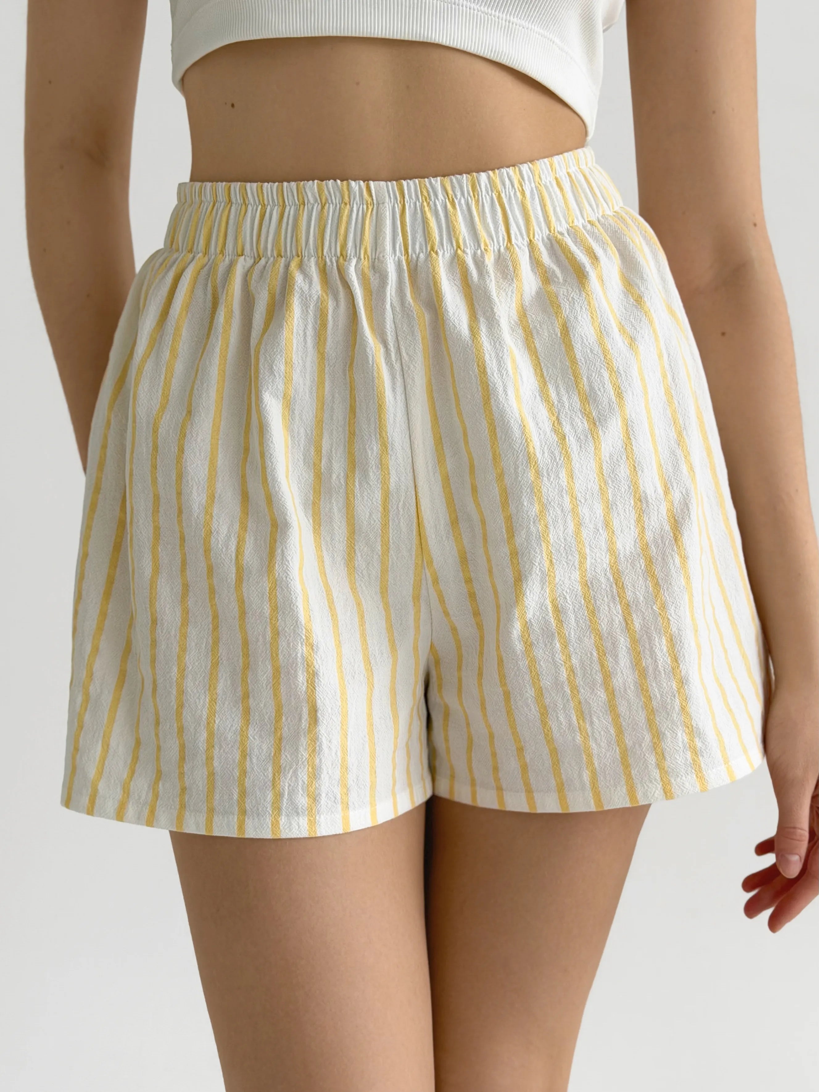 Mono cotton shorts “yellow stripe on milky”