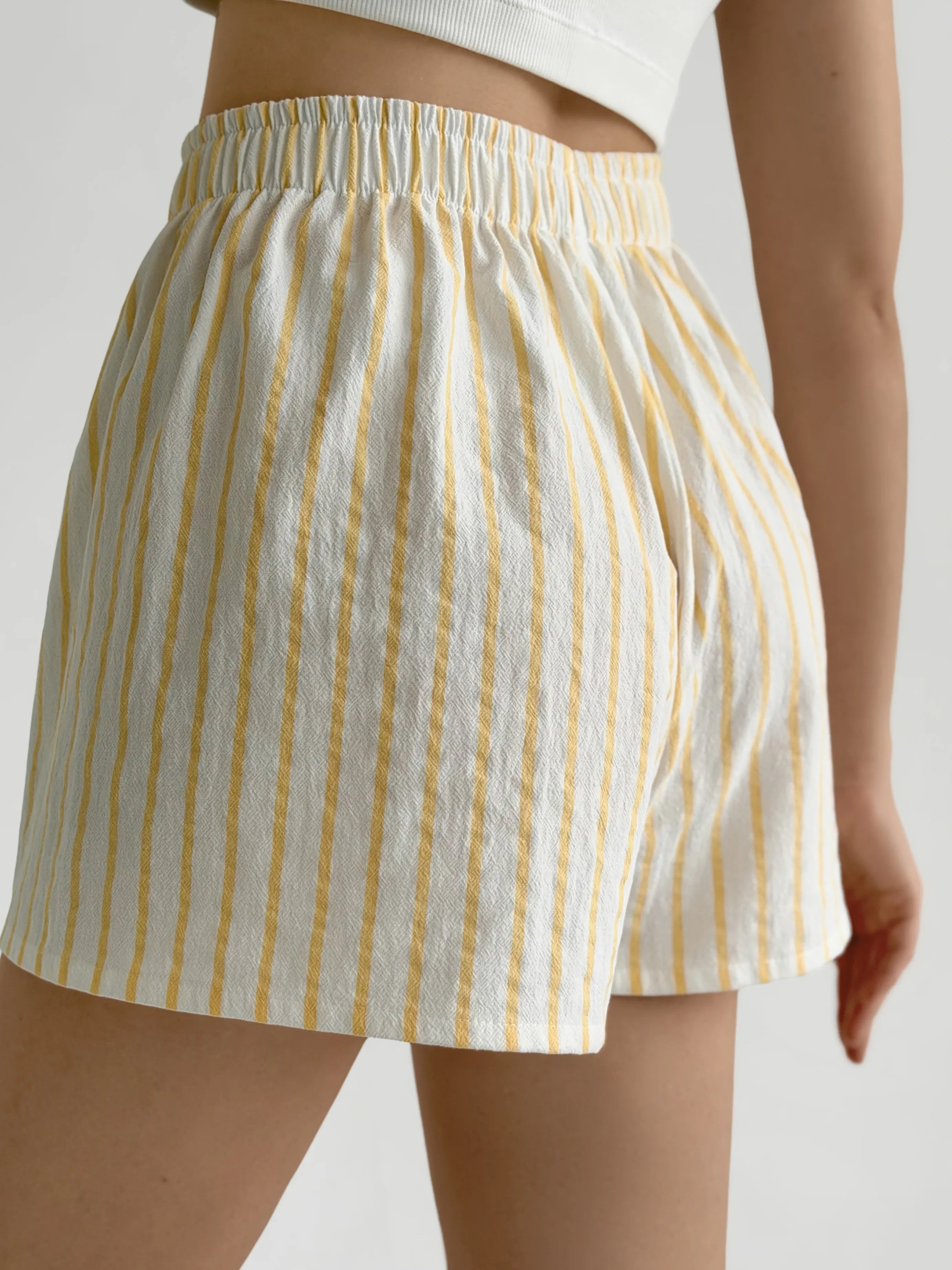 Mono cotton shorts “yellow stripe on milky”