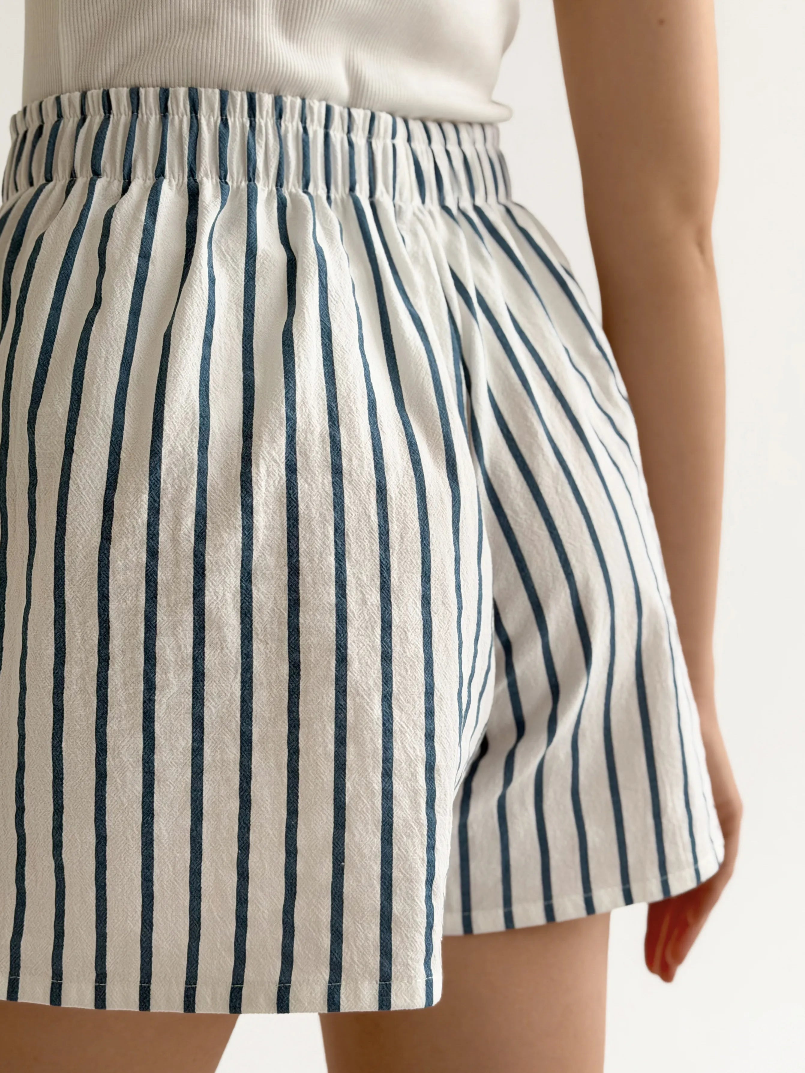 Mono cotton shorts “turquoise stripe on milk”