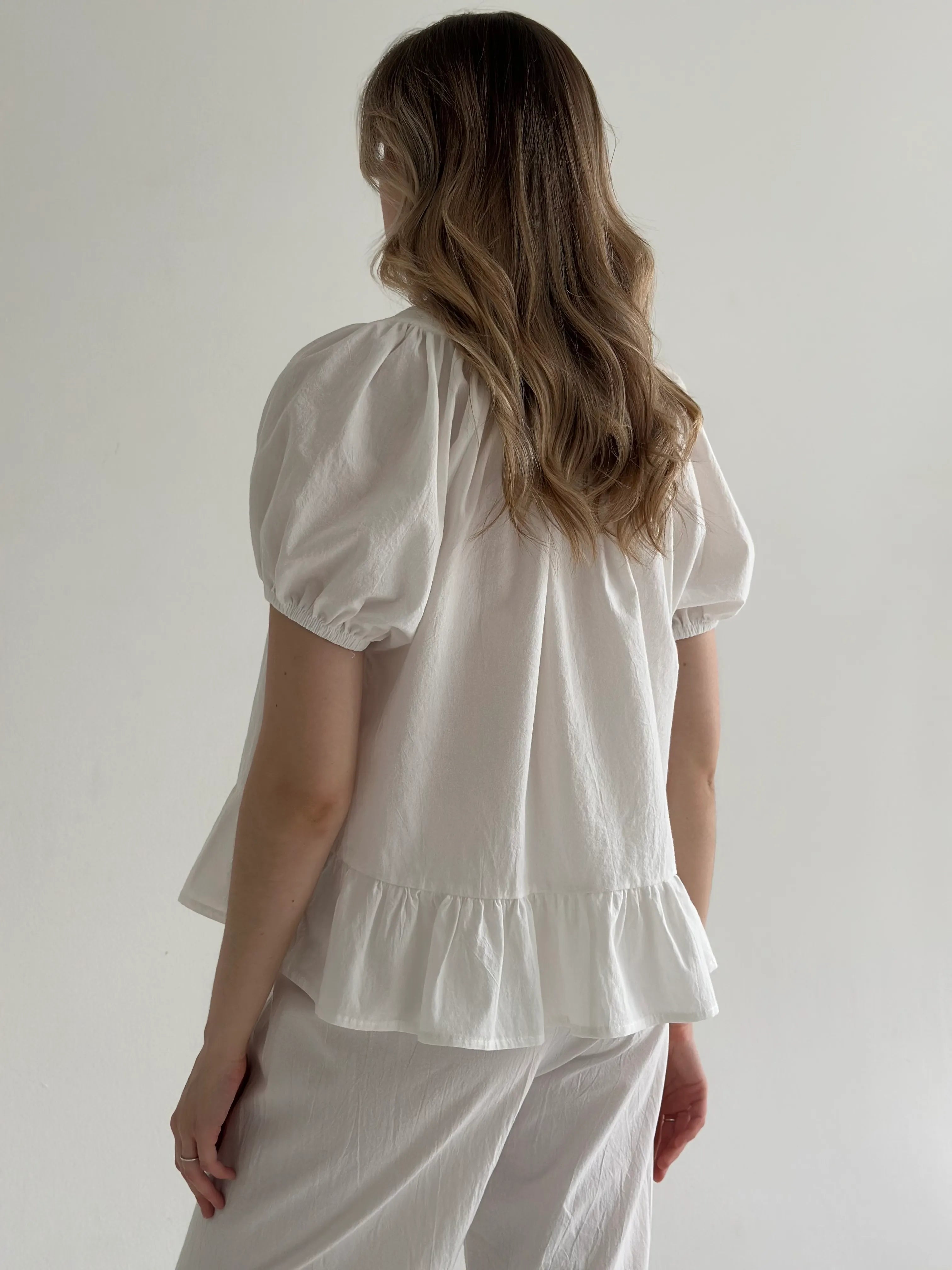 Suit blouse and trousers with ruffles, cotton, milky