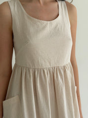 Cotton sundress, thin stripe, with patch pockets, beige/milk