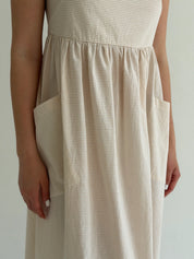 Cotton sundress, thin stripe, with patch pockets, beige/milk